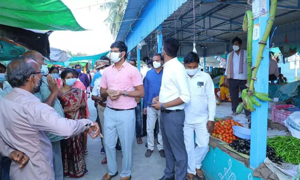 District Collector VP Gautham inspecting the Integrated Vegetarian Market in Khammam on Monday