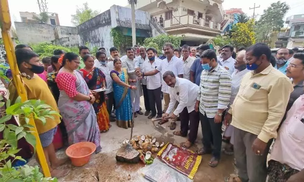 Deputy Chief Minister Amzath Basha laying foundation stone for construction of roads and drainage canals at 37th division in Kadapa on Monday