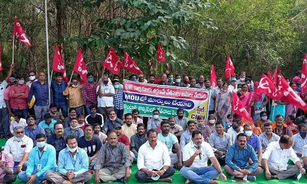 VSP Recognised Union leaders and activists holding a dharna in Visakhapatnam on Wednesday