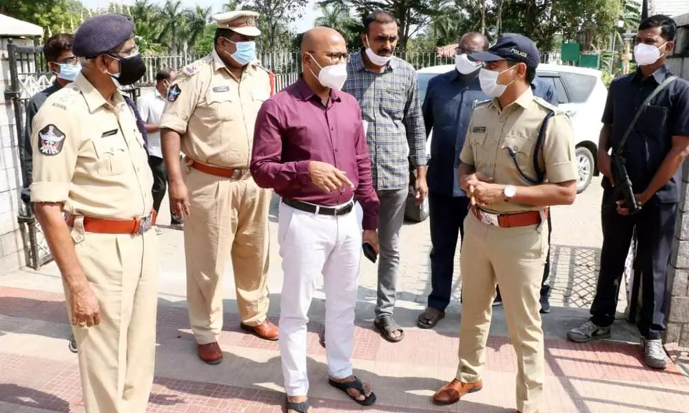 Urban SP Venkata Appala Naidu along with TTD CVSO Gopinath Jatti inspecting the arrangements being made for issue of tokens to locals for Vaikunta Dwara Darshanam in Tirumala temple, in Tirupati on Wednesday