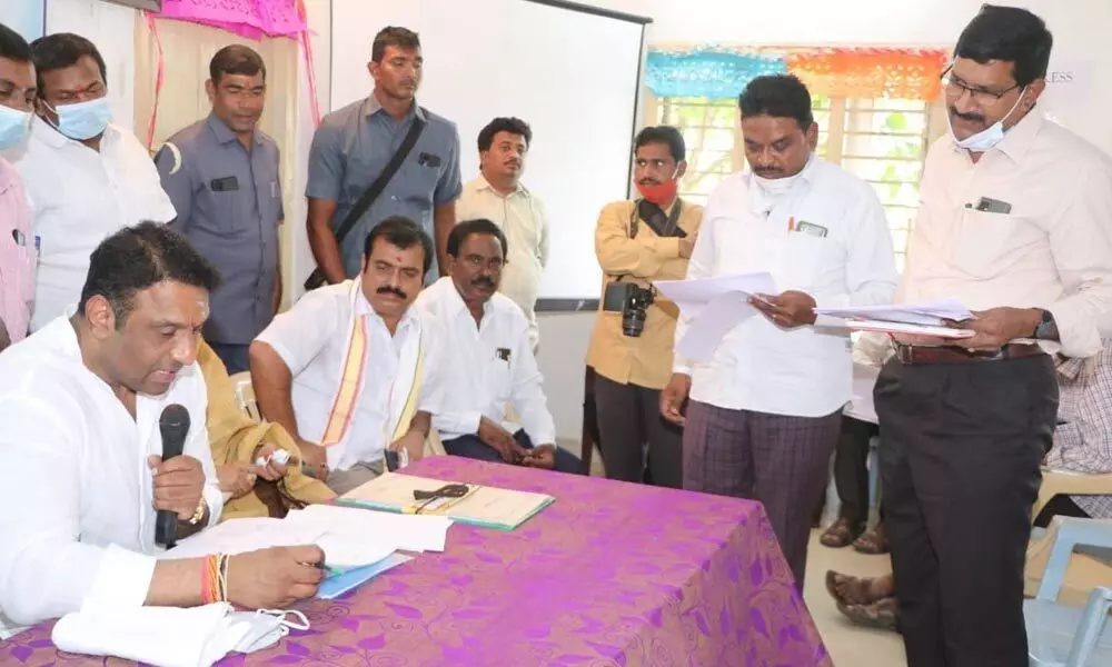 Minister for IT M Goutham Reddy interacting with officials in Atmakur constituency  on Wednesday