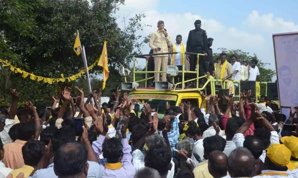 TDP chief N Chandrababu Naidu addressing the people during his visit to several villages in Kuppam constituency on Thursday