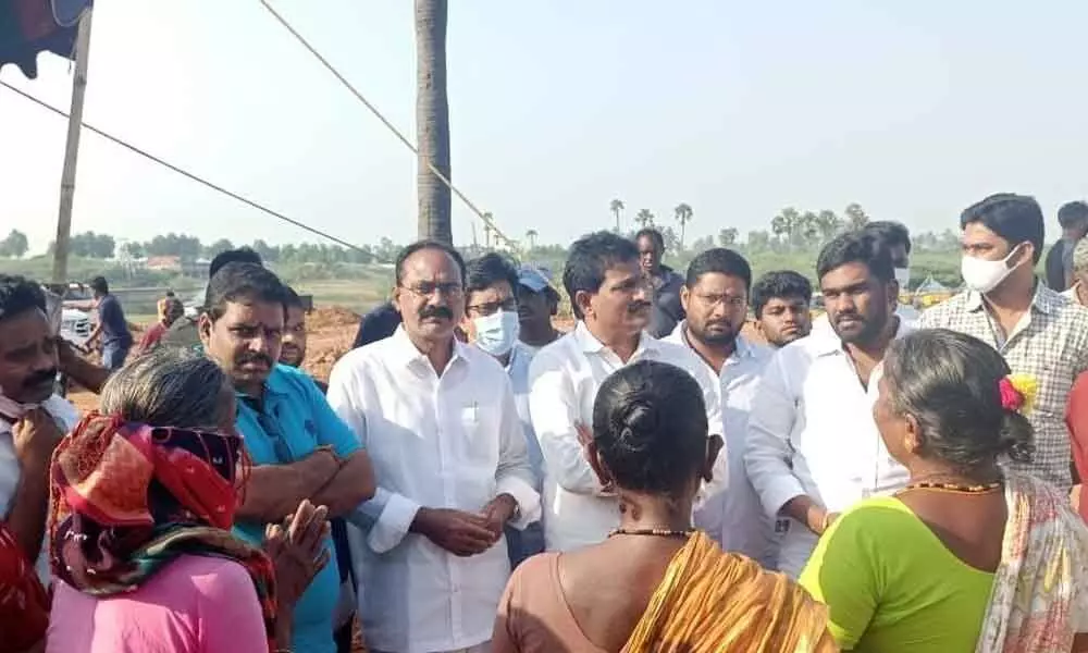 JSP leaders interacting with the fishermen in Visakhapatnam on Thursday