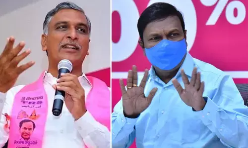 Health Minister Harish Rao and Health Director Srinivasa Rao