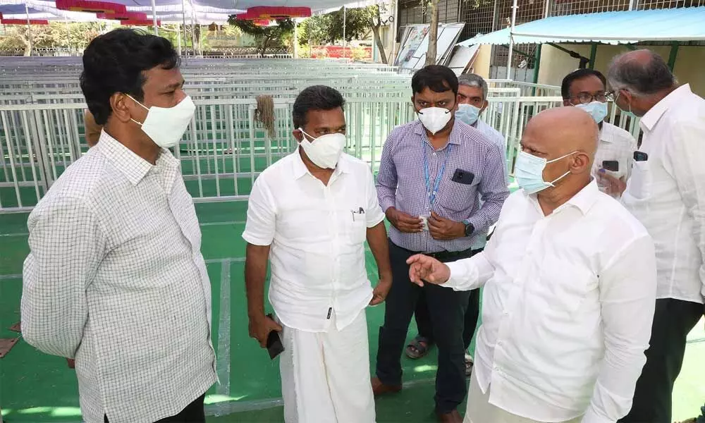 TTD additional EO A V Dharma Reddy inspecting the arrangements being made for issue of tokens to locals for Vaikunta Dwara Darshanam in Tirumala temple, at five centers in Tirupati on Saturday