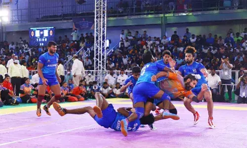 Players of Andhra and SSB teams in action during their quarterfinals match on the fourth day of the National Invitation Kabaddi tournament in Tirupati on Saturday. (Photo: Kalakata Radha Krishna)