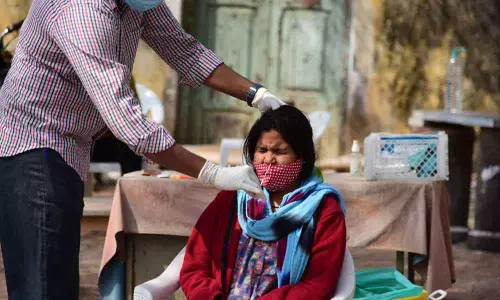 Amid the surge of Corona cases and the threat of highly transmissible Omicron variant, Covid tests and vaccination for 15-17 age group have been ramped up. Tests and vaccination are being held at a brisk pace at Fever Hospitals in Hyderabad.	Photos: Srinivas Setty
