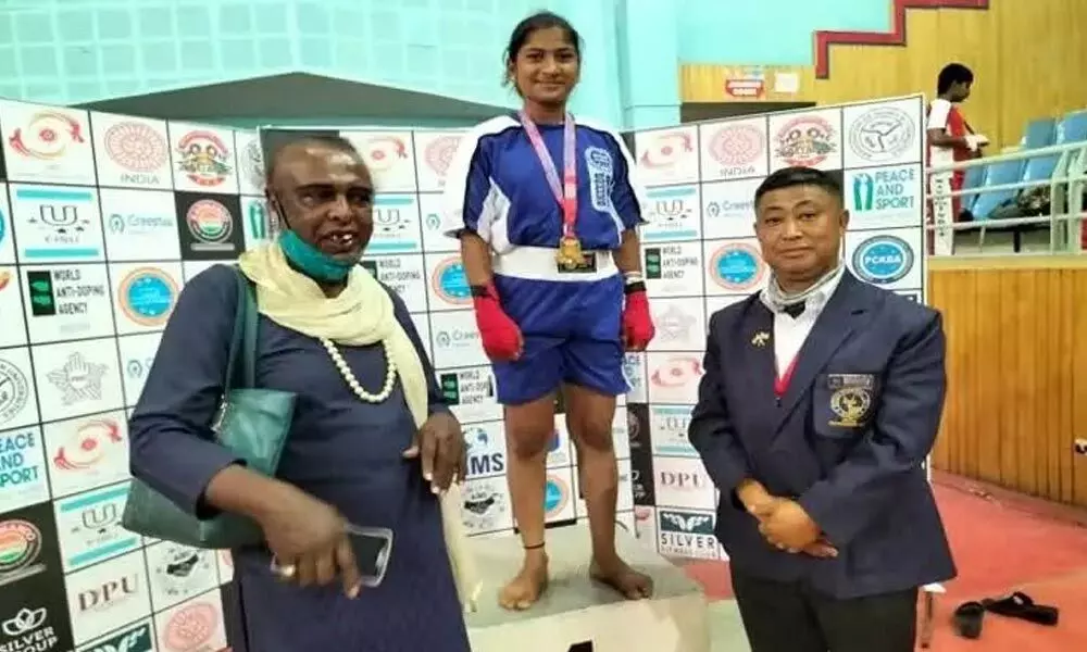 Transgender’s adopted granddaughter bags gold in national kickboxing event