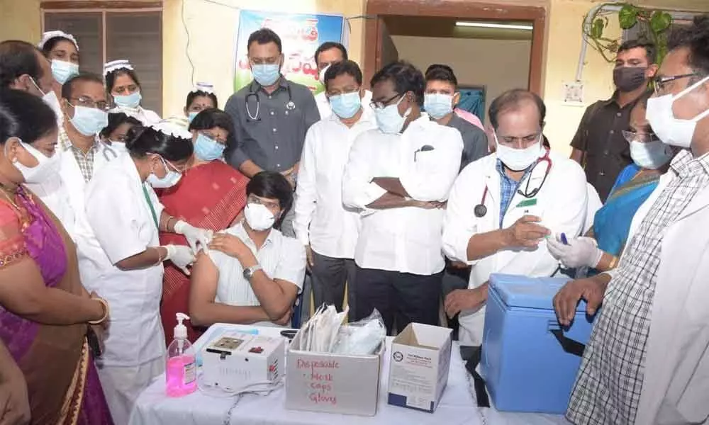 District Collector VP Gautham taking jab during the booster dose vaccination drive launch at the government hospital in Khammam on Monday