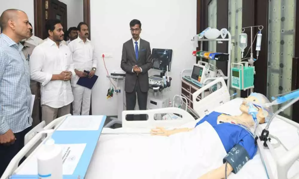 Medical and health department officials explain functioning of advanced medical equipment to Chief Minister Y S Jagan Mohan Reddy at his camp office in Tadepalli on Monday