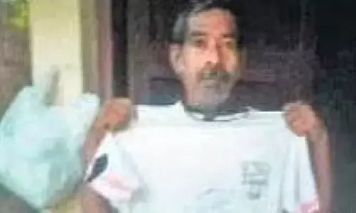 Muhammed Anwar now, with the signed T-shirt