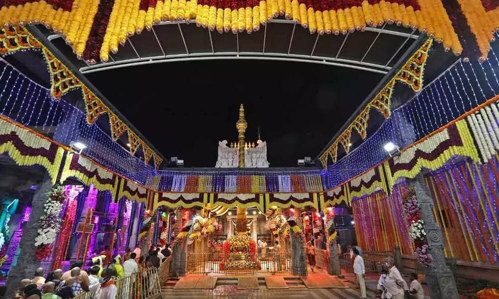 The Tirumala temple is decorated with lights and flowers on the auspicious occasion of Vaikunta Ekadasi on Wednesday