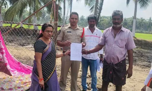 Police and revenue officials serving notices to cockfight organisers in Amalapuram constituency of East Godavari district on Wednesday