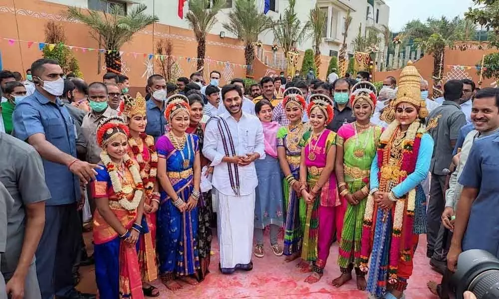 Chief Minister YS Jagan Mohan Reddy along with the dance students and their guru at Sankranti celebrations programme at Tadepalli on Friday