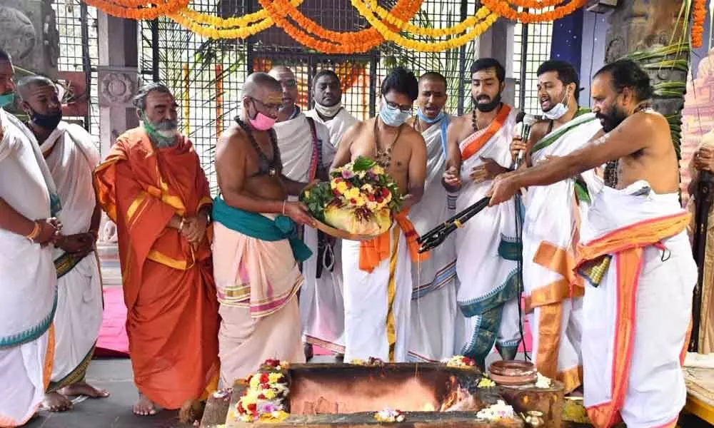 A homam being performed at Srisailam temple on Monday as part of Sankranti Brahmotsavams