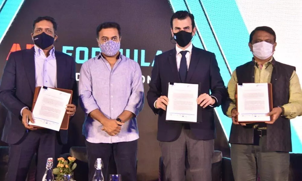 (From L-R) Greenko CEO Anil Chalamalasetty, Industries and Commerce Minister KT Rama Rao, Formula E Co Founder Alberto Longo, and MAUD Special Chief Secretary Arvind Kumar at the LOI signing ceremony in Hyderabad on Monday