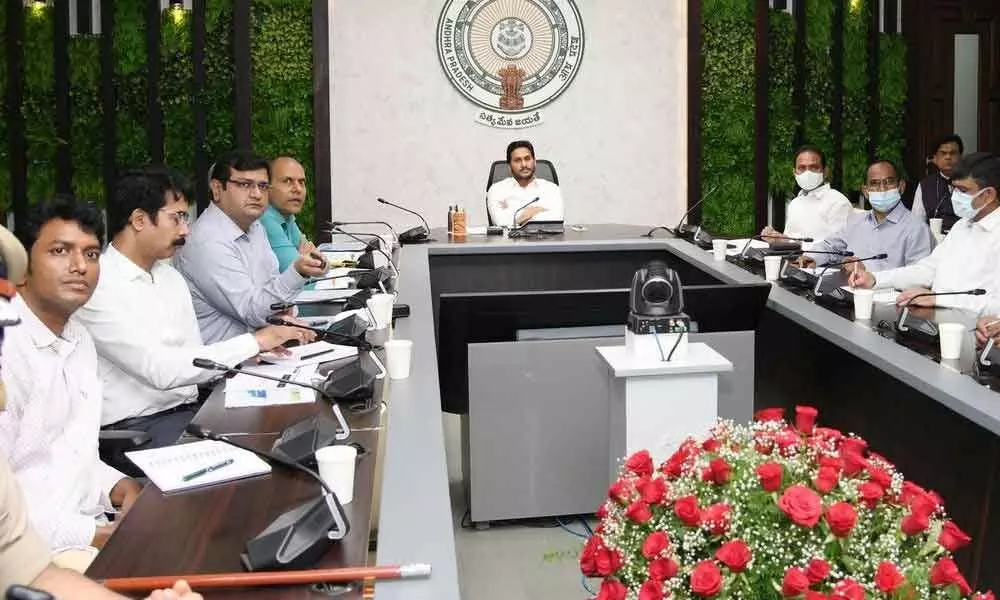 Chief Minister Y S Jagan Mohan Reddy reviews Covid control and vaccination at his camp office on Monday