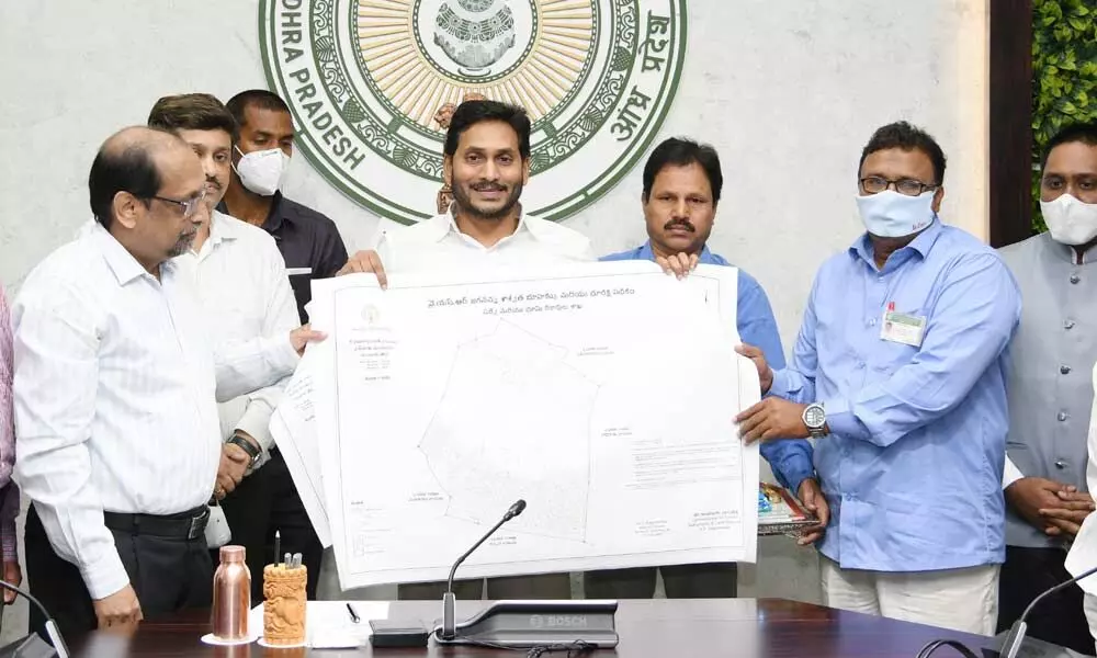Chief Minister Y S Jagan Mohan Reddy dedicates the new land records of 29,563 acres, which were re-surveyed after 100 years under YSR Jagananna Saswatha Bhoo Hakku and Bhoo Raksha Pathakam, at his camp office in Tadepalli on Tuesday