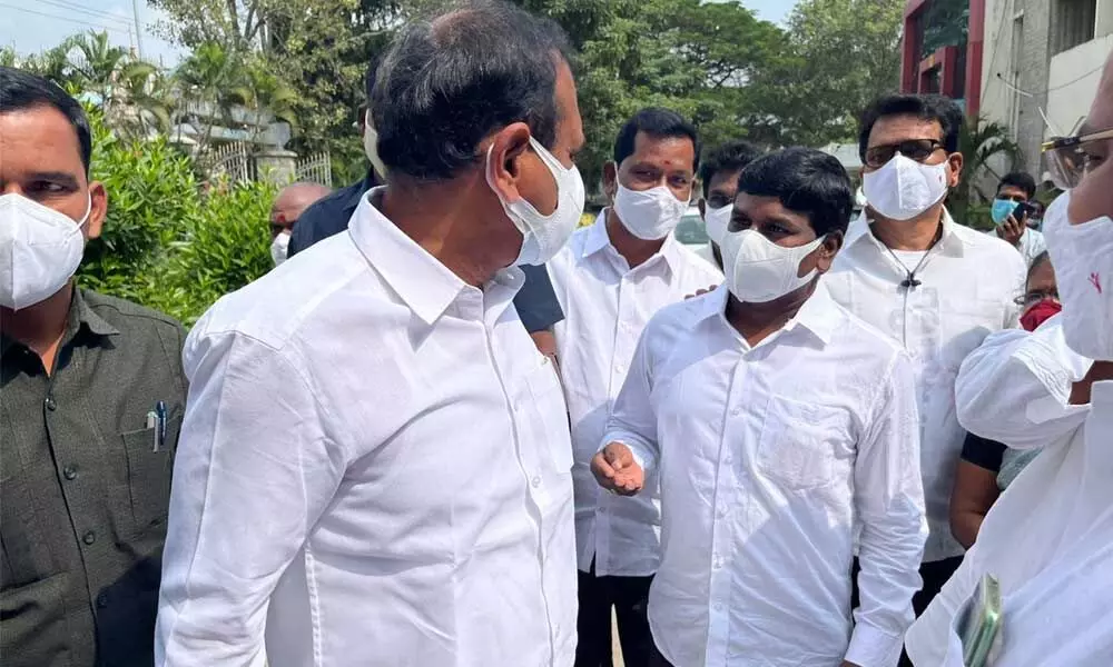 CPI leaders J Viswanath, K Kumar Reddy and others speaking to MLA B Karunakar Reddy and expressing concern over the increase in Covid cases in Tirupati on Tuesday