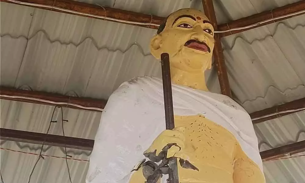 The damage statue of Gandhi in  Borlam village in Banswada mandal of Kamareddy district on Tuesday