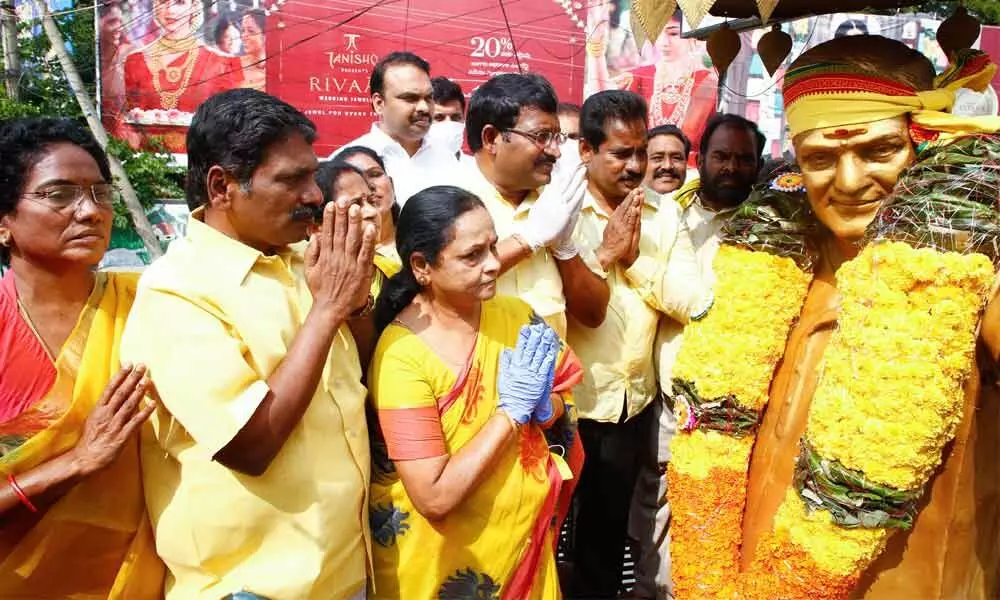 TDP leaders paying tributes to party founder and former Chief Minister N T Rama Rao in Tirupati on Tuesday