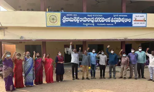 Municipal teachers under the banner of AP State Municipal Teachers Federation staging a protest at Sriramishetty Ramarao municipal high school in Gujjanagundla, Guntur on Tuesday