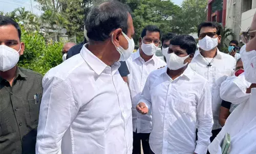 CPI leaders J Viswanath, K Kumar Reddy and others speaking to MLA B Karunakar Reddy and expressing concern over the increase in Covid cases in Tirupati on Tuesday