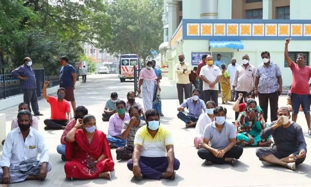 Corona patients of Vishnu Nivasam staging a dharna in Tirupati on Thursday