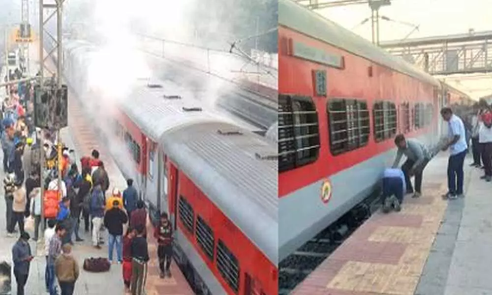 Smoke from Visakha-Delhi AP express train triggers panic in passengers near Nekkonda
