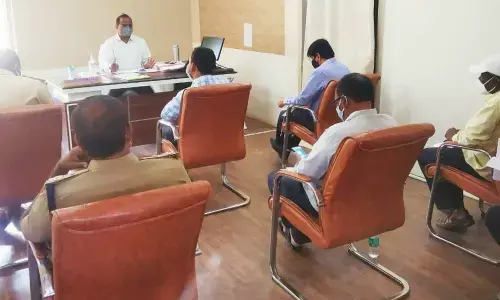 Additional Collector Chandra Reddy directing officials to take stock of all unauthorised buildings and layouts in Narayanpet and take action against them