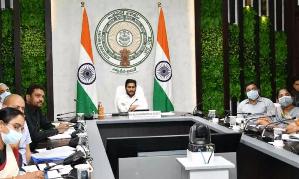 Chief Minister Y S Jagan Mohan Reddy and senior officials taking part in a video-conference convened by Prime Minister Narendra Modi  on Saturday