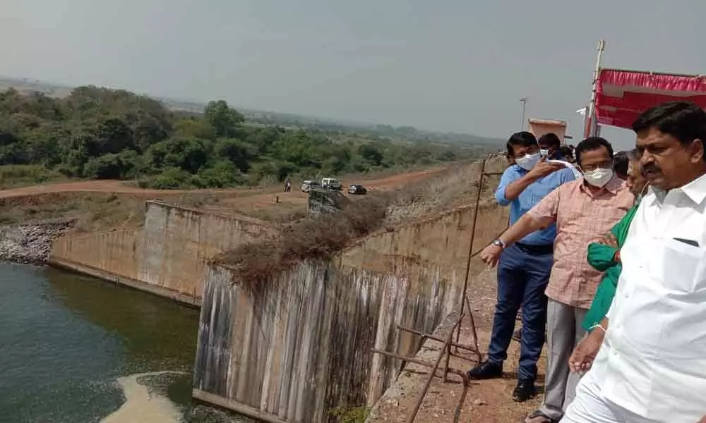 Public Accounts Committee Chairman Payyavula Keshav inspecting Velugodu balancing reservoir on Saturday. Panyam MLA Katasani Rambhupal Reddy, Joint Collector S Ramasunder Reddy and others are also seen