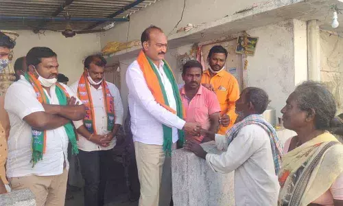 BJP Kisan Morch State president Kondapalli Sridhar Reddy met the loan victim family members in Khammam on Saturday