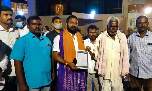 Excise Minister Srinivas Goud handing over concent letter for Rs 1 lakh from CMRF to an ailing patient on Saturday