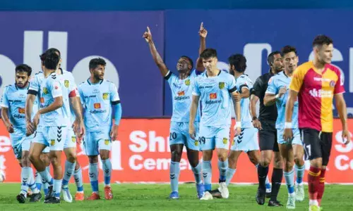 HFCs Ogbeche celebrates with team mates after scoring a goal against SCEB in the first half on Monday.