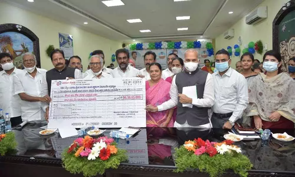 The officials releasing  funds of EBC Nestham scheme at a programme  held at the Collectorate in Guntur city on Tuesday