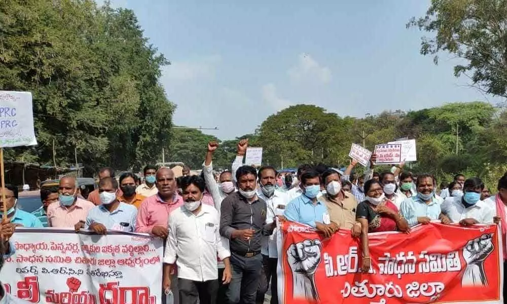 Government employees taking part in a rally in Chittoor on Tuesday
