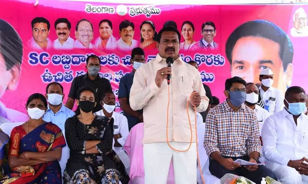 Government Whip Gampa Govarthan speaking at a loan distribution program for and street vendors in Kamareddy on Tuesday