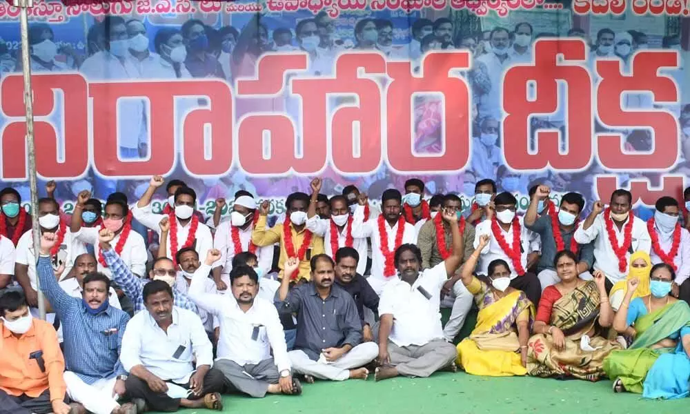 Employees, pensioners and teachers participating in the relay hunger strike at the Collectorate in Ongole on Thursday