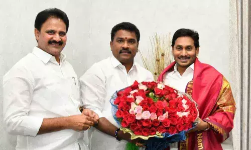 Rajya Sabha Member Mopidevi Venkata Ramana Rao and Mayor Kavati Siva Naga Manohar Naidu meet Chief Minister YS Jagan Mohan Reddy at his camp office in Tadepalli in Guntur district on Friday