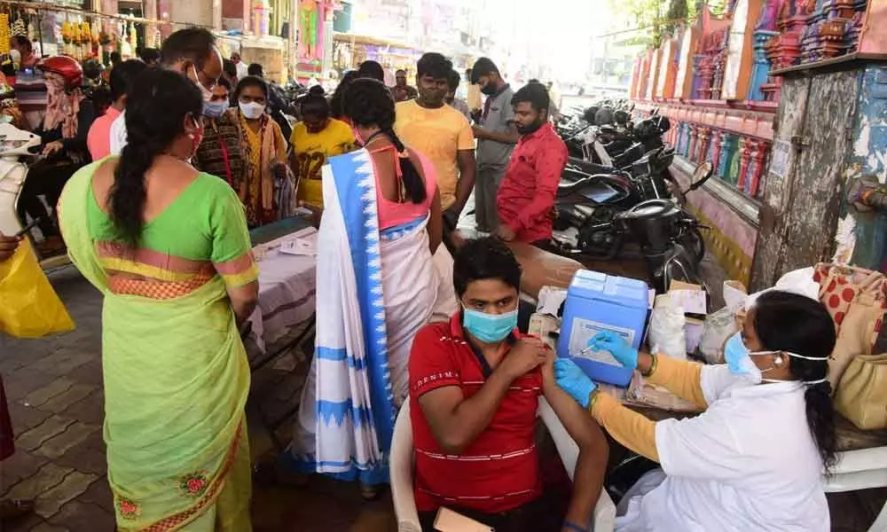 Vaccination for both first and second doses underway at Mahankali Temple, Secunderabad 	Photo: Srinivas Setty