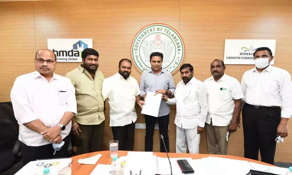 Minister for MA&UD KT Rama Rao handing over NUDA GO to MLA Bhupal Reddy in the presence of Minister Jagadish Reddy in a meeting held in Hyderabad on Monday