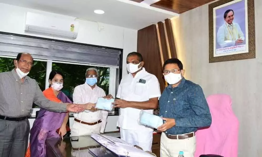 BN Rao Foundation handing over  surgical masks to Mayor Y Sunil Rao  in Karimnagar on Monday