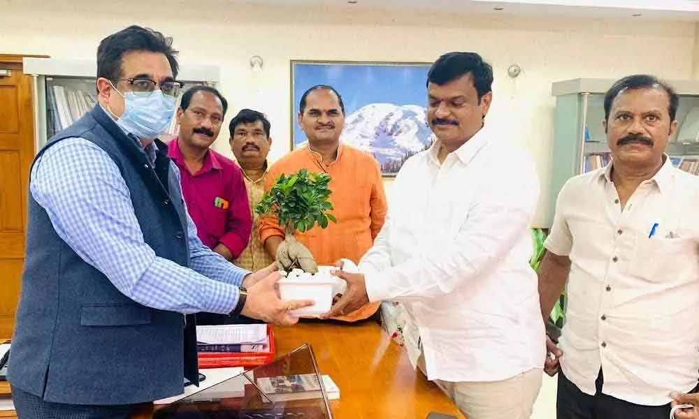 BJP MLC PVN Madhav with Visakhapatnam Steel Plant CMD Atul Bhatt in Visakhapatnam on Monday