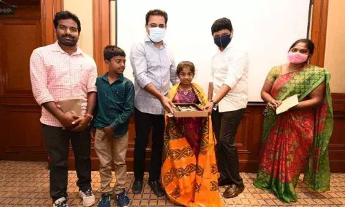 Minister KT Rama Rao felicitating Blessy in Hyderabad on Monday.