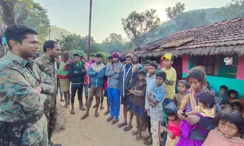 Paderu and Munchingiputtu police counselling villagers in Visakhapatnam on Tuesday