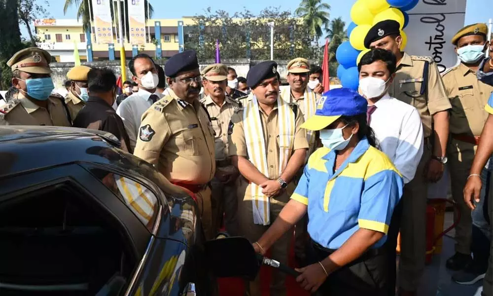 Visakhapatnam Range IG LKV Rangarao and SP B Krishna Rao inaugurating police welfare petrol station in Visakhapatnam on Wednesday