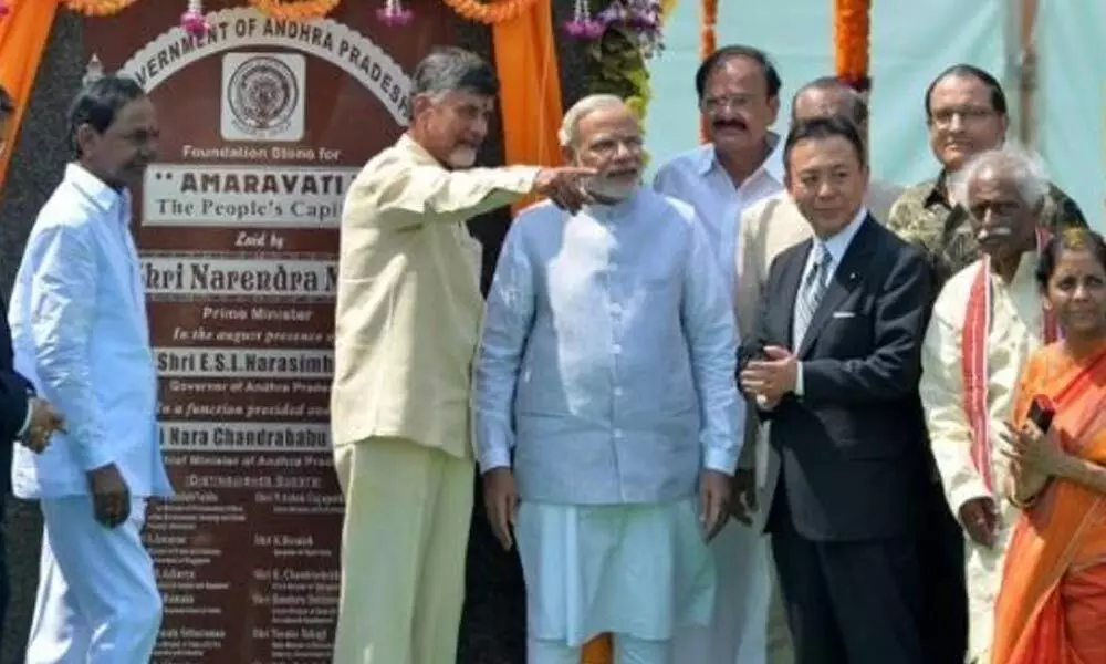 Former Chief Minister N Chandrababu Naidu and Prime Minister Narendra Modi at the unveiling of pylon for construction of capital Amaravati in October, 2015 (file picture)