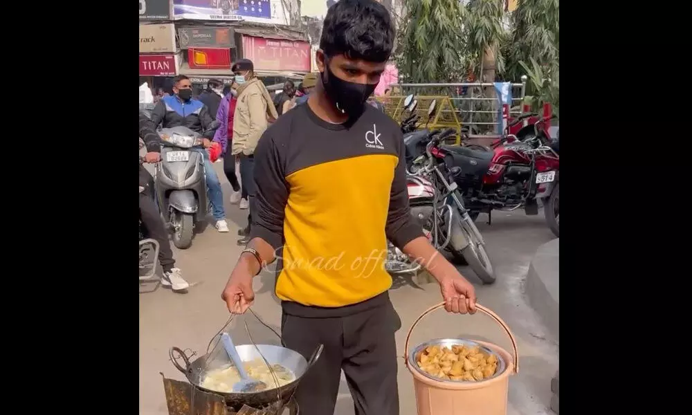Watch The Trending Video Of A Young Boy Selling Samosa In Unique Style