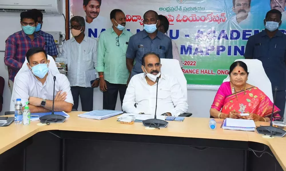 Minister Balineni Srinivasa Reddy speaking at an orientation programme to MLAs and MLCs on mapping of schools, at Ongole Collectorate on Thursday. District Collector Pravin Kumar is also seen